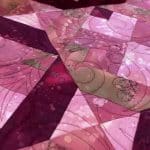 Hope’s “Maroon” quilt - Longarm quilted by Maynard Longarm Quilting