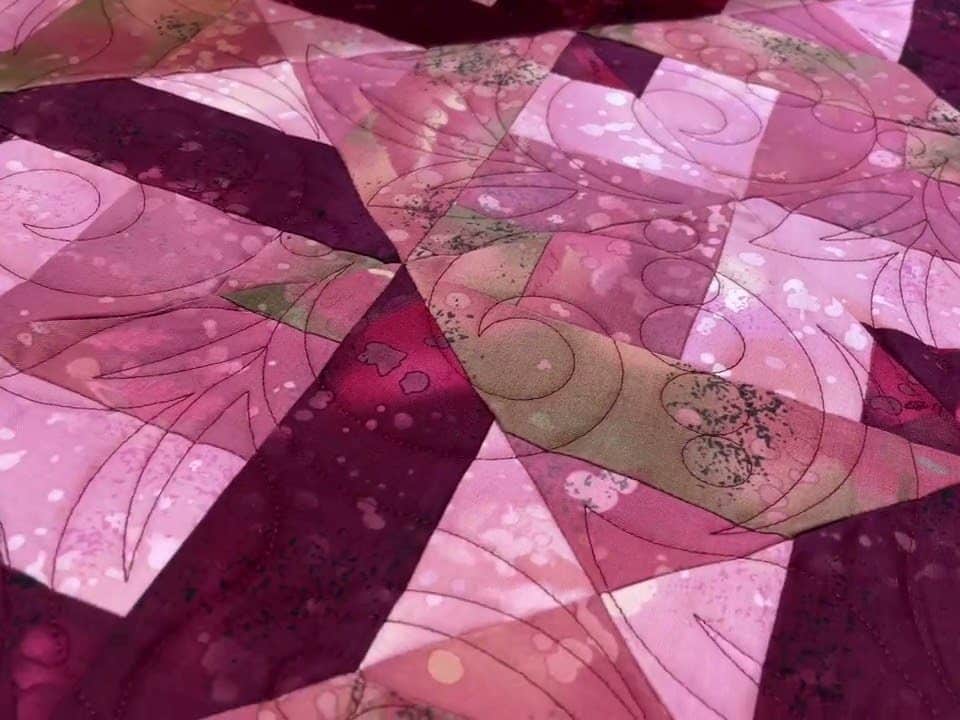Hope’s “Maroon” quilt - Longarm quilted by Maynard Longarm Quilting