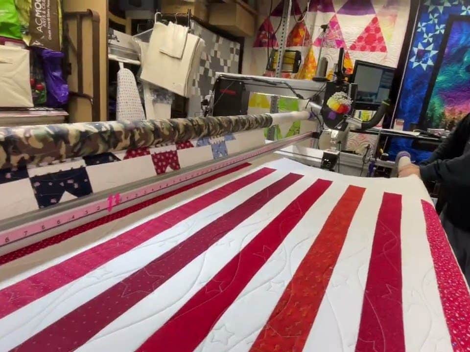 Susan’s “QOV” quilt - Longarm quilted by Maynard Longarm Quilting