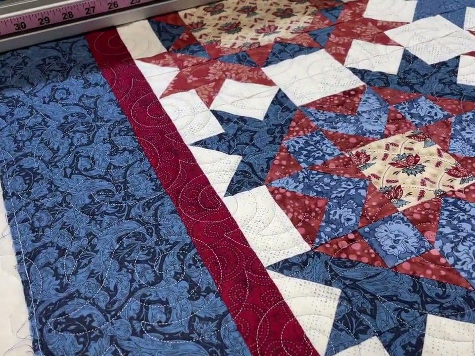 Kathy’s “Patriotic Stars” quilt - Longarm quilted by Maynard Longarm Quilting