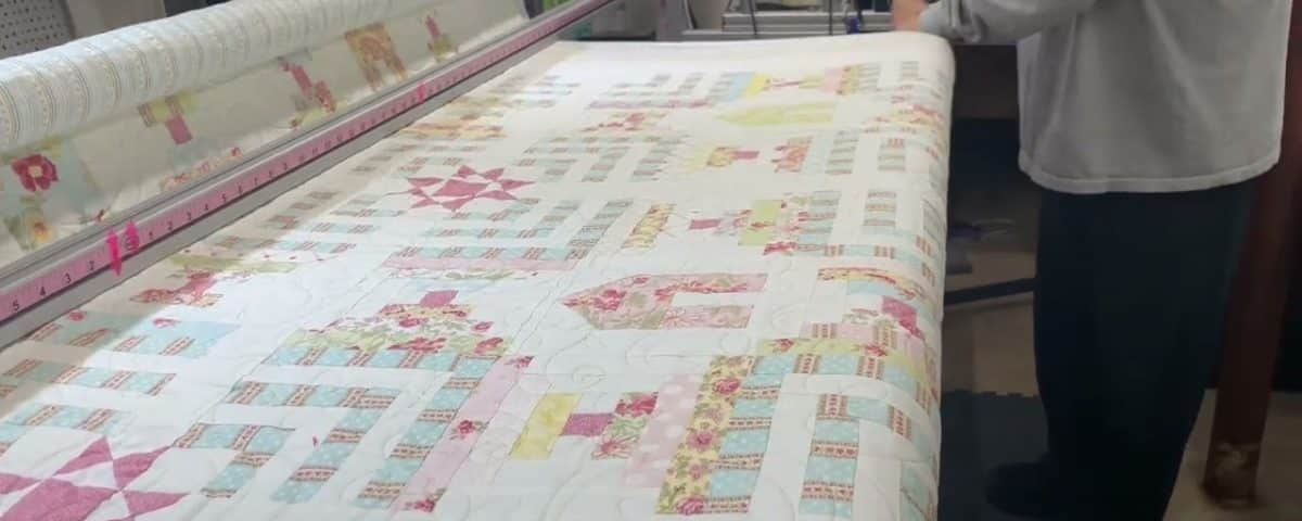 Cathy’s “Houses & Steps” quilt - Longarm quilted by Maynard Longarm Quilting