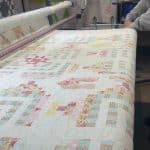 Cathy’s “Houses & Steps” quilt - Longarm quilted by Maynard Longarm Quilting