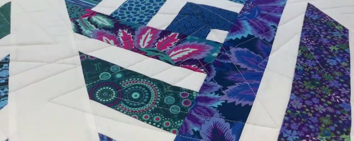 Barb’s “Arrow” quilt - Longarm quilted by Maynard Longarm Quilting