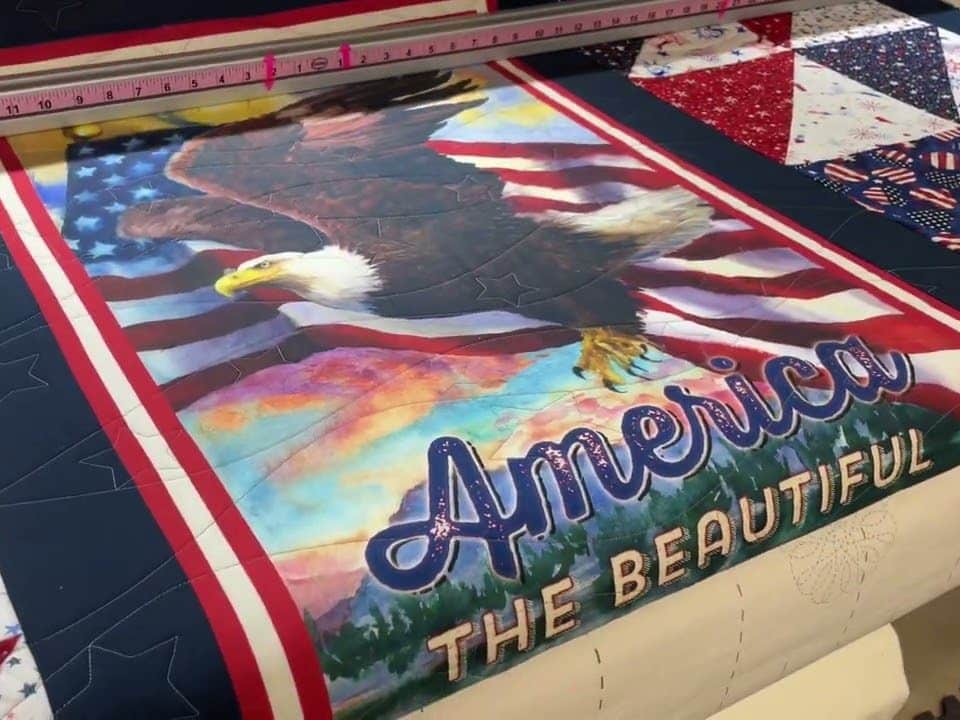 Barb’s “America the Beautiful” panel quilt - Longarm quilted by Maynard Longarm Quilting