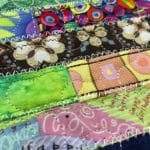 Libby’s “Watchband” Table Runner - Longarm quilted by Maynard Longarm Quilting