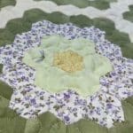 Cathie’s “Grandmother’s Garden” quilt - Longarm quilted by Maynard Longarm Quilting