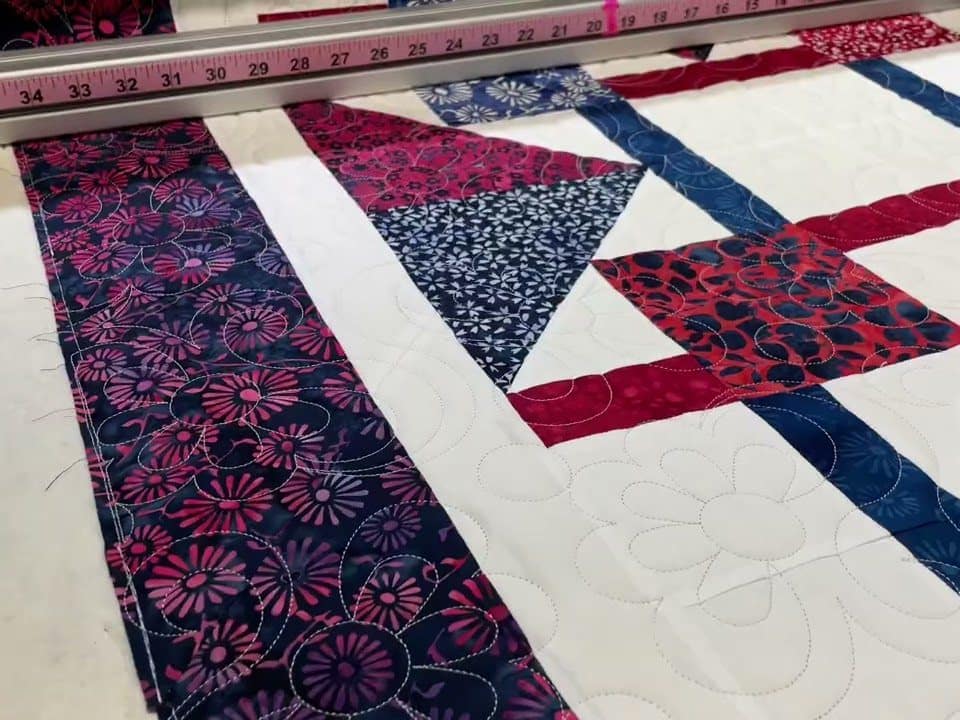 Karen’s “QOV” quilt - Longarm quilted by Maynard Longarm Quilting