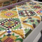 Leslie’s “Saturday Sampler-BOM” quilt - Longarm quilted by Maynard Longarm Quilting