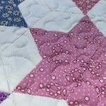 Cathie’s “HEXY Stars” quilt - Longarm quilted by Maynard Longarm Quilting