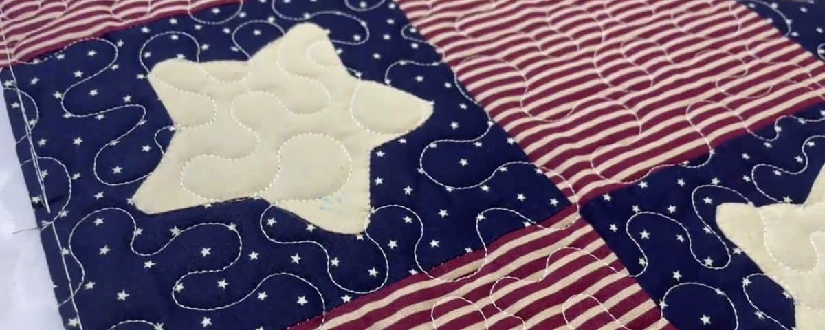 Cathie’s “Appliquéd Stars” quilt - Longarm quilted by Maynard Longarm Quilting