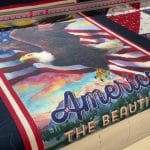 Barb’s “America the Beautiful” panel quilt - Longarm quilted by Maynard Longarm Quilting