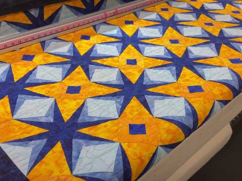 Tiffany’s “Split Star” quilt - Longarm quilted by Maynard Longarm Quilting