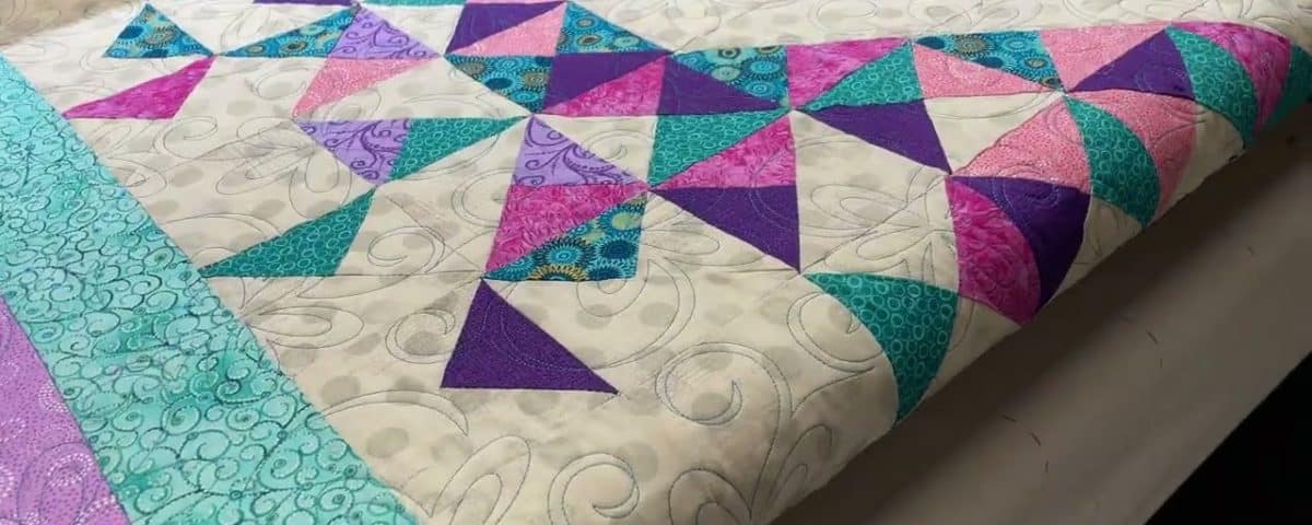 Monica’s “Exploding Heart” quilt - Longarm quilted by Maynard Longarm Quilting