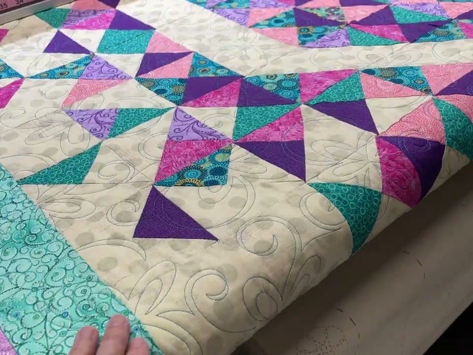 Monica’s “Exploding Heart” quilt - Longarm quilted by Maynard Longarm Quilting