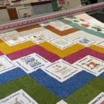 Susan’s “2024 Shop Hop” quilt - Longarm quilted by Maynard Longarm Quilting