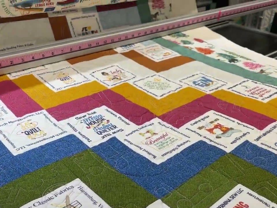 Susan’s “2024 Shop Hop” quilt - Longarm quilted by Maynard Longarm Quilting
