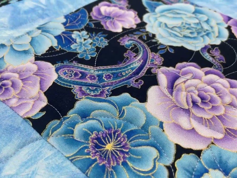 Loriann’s “Purple Flowers” quilt - Longarm quilted by Maynard Longarm Quilting