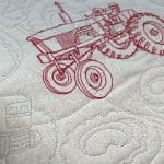 Gloria’s “Tractor” quilt - Longarm quilted by Maynard Longarm Quilting