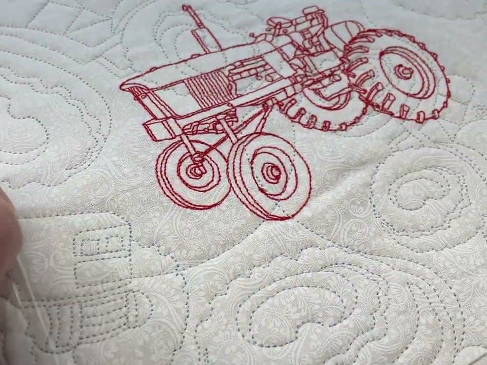 Gloria’s “Tractor” quilt - Longarm quilted by Maynard Longarm Quilting