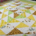 Joann’s “Baby Zoo” quilt - Longarm quilted by Maynard Longarm Quilting