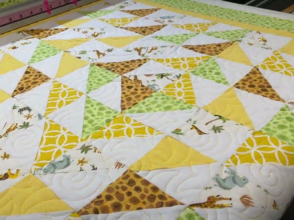 Joann’s “Baby Zoo” quilt - Longarm quilted by Maynard Longarm Quilting