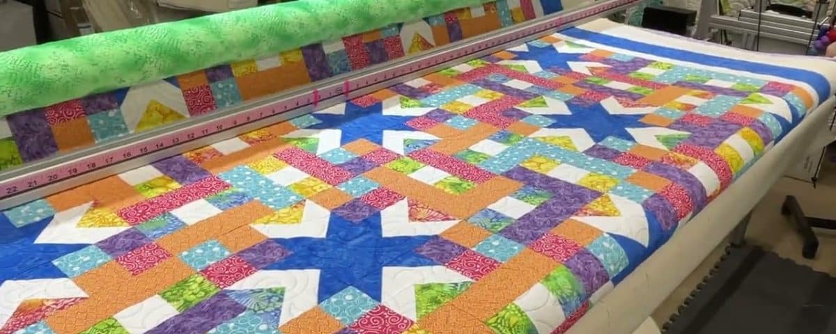 Barb’s “Woven Stars” Mystery quilt - Longarm quilted by Maynard Longarm Quilting