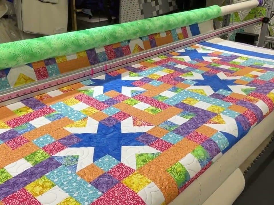 Barb’s “Woven Stars” Mystery quilt - Longarm quilted by Maynard Longarm Quilting