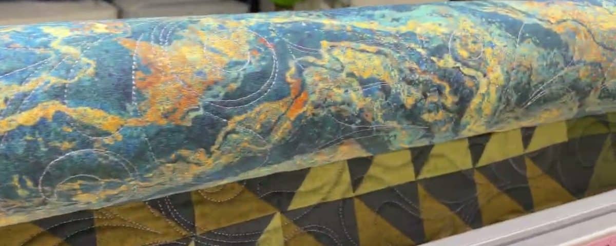 Justine’s “Feathered Stars” quilt - Longarm quilted by Maynard Longarm Quilting
