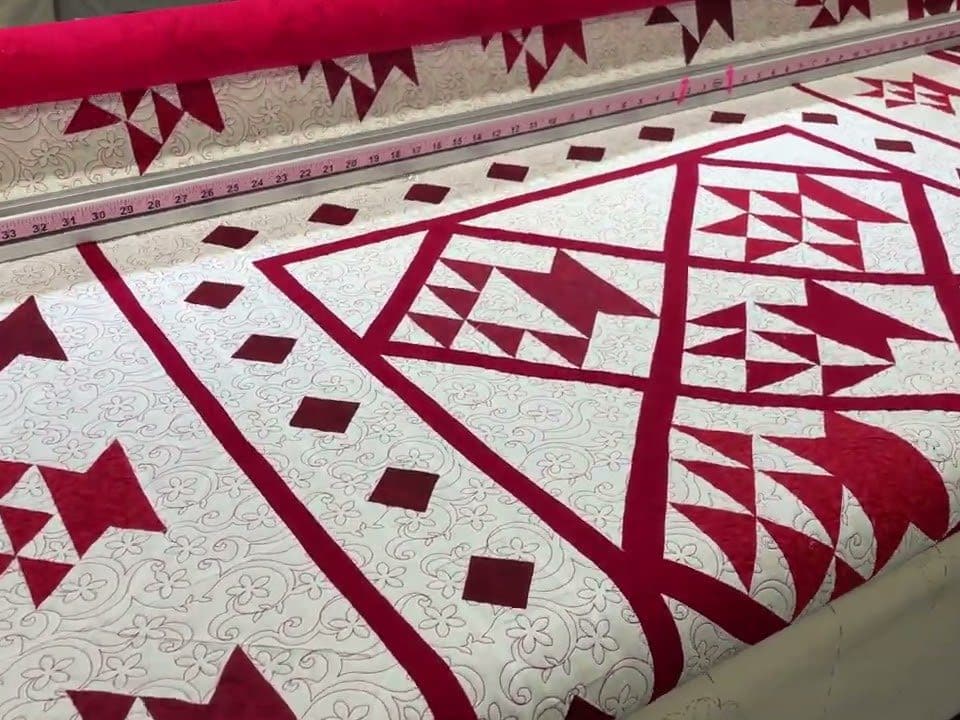Carol B’s “Red Baskets” quilt - Longarm quilted by Maynard Longarm Quilting