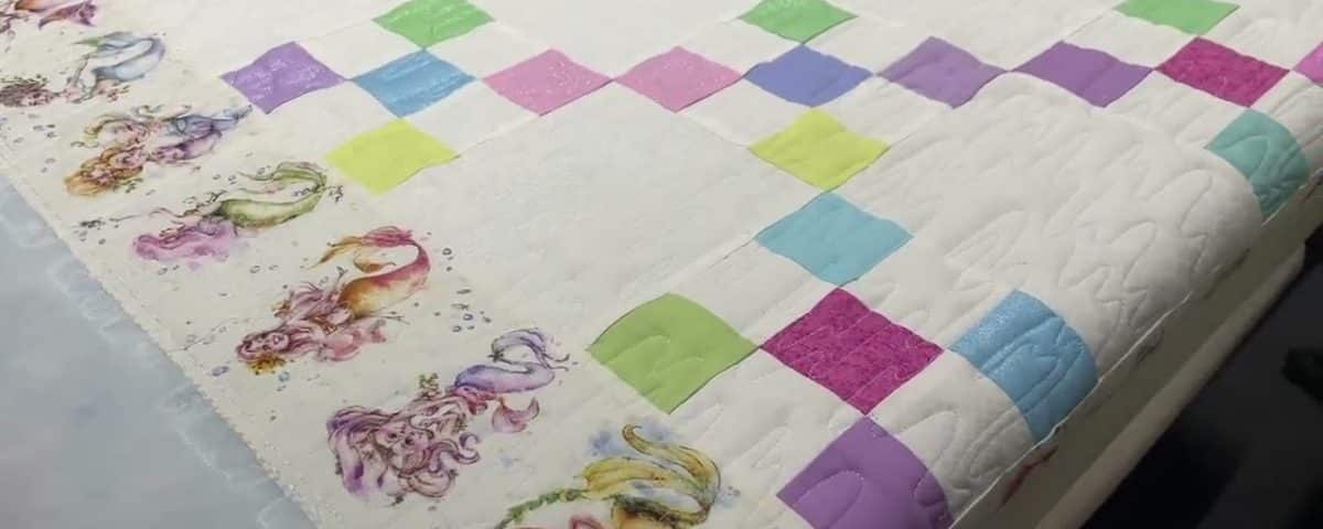 Cathie’s “Mermaid chain” quilt - Longarm quilted by Maynard Longarm Quilting