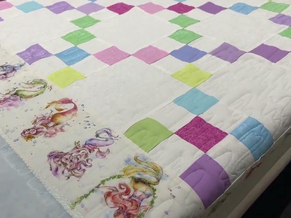 Cathie’s “Mermaid chain” quilt - Longarm quilted by Maynard Longarm Quilting