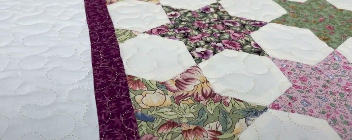 Cathie’s “Hand-pieced Stars” quilt - Longarm quilted by Maynard Longarm Quilting