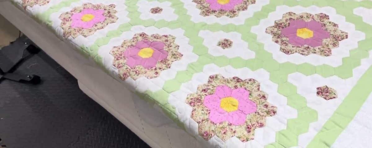Cathie’s “Grandmother’s Variation” quilt - Longarm quilted by Maynard Longarm Quilting