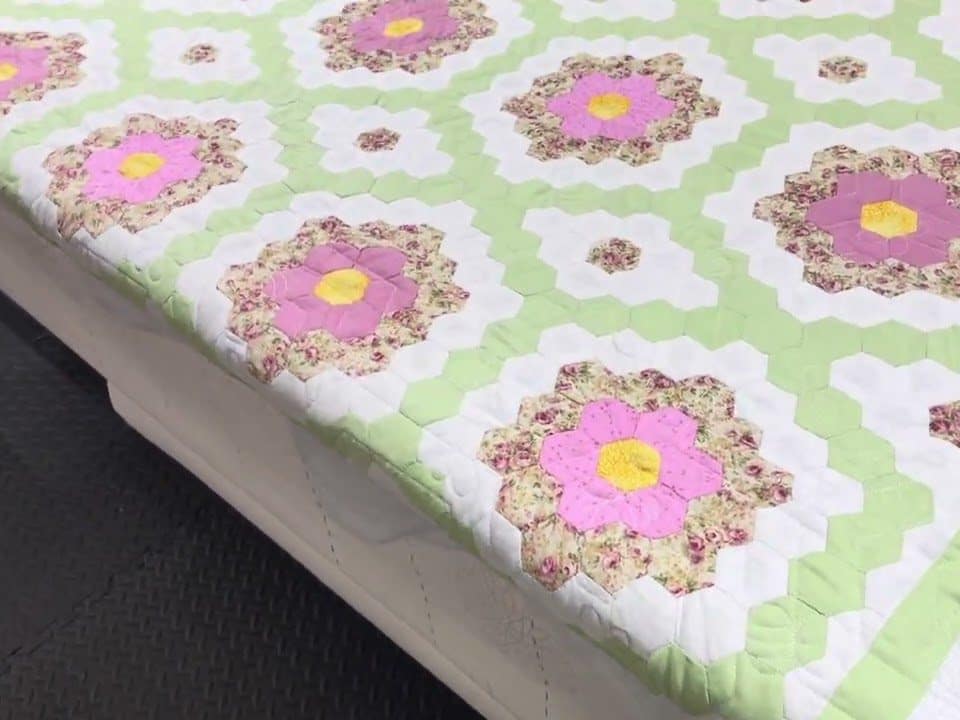 Cathie’s “Grandmother’s Variation” quilt - Longarm quilted by Maynard Longarm Quilting