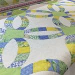 Karen’s “Metro Rings” quilt - Longarm quilted by Maynard Longarm Quilting