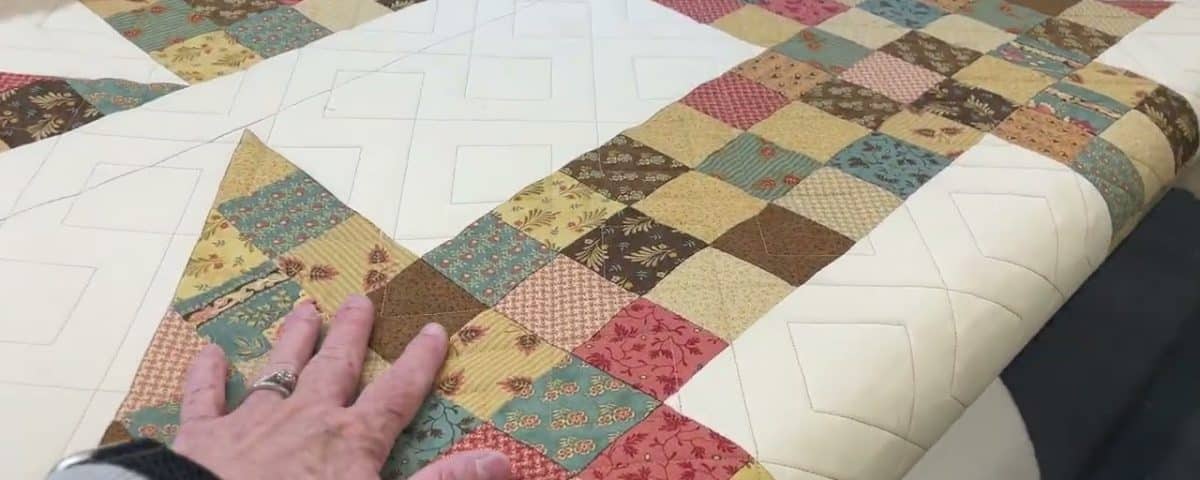 Leslie’s “Double Churndash” quilt - Longarm quilted by Maynard Longarm Quilting