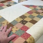 Leslie’s “Double Churndash” quilt - Longarm quilted by Maynard Longarm Quilting