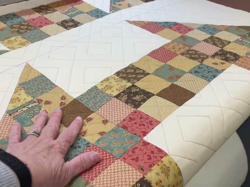 Leslie’s “Double Churndash” quilt - Longarm quilted by Maynard Longarm Quilting