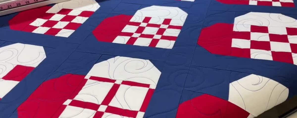 Doreen’s “Scandi Hearts” quilt - Longarm quilted by Maynard Longarm Quilting