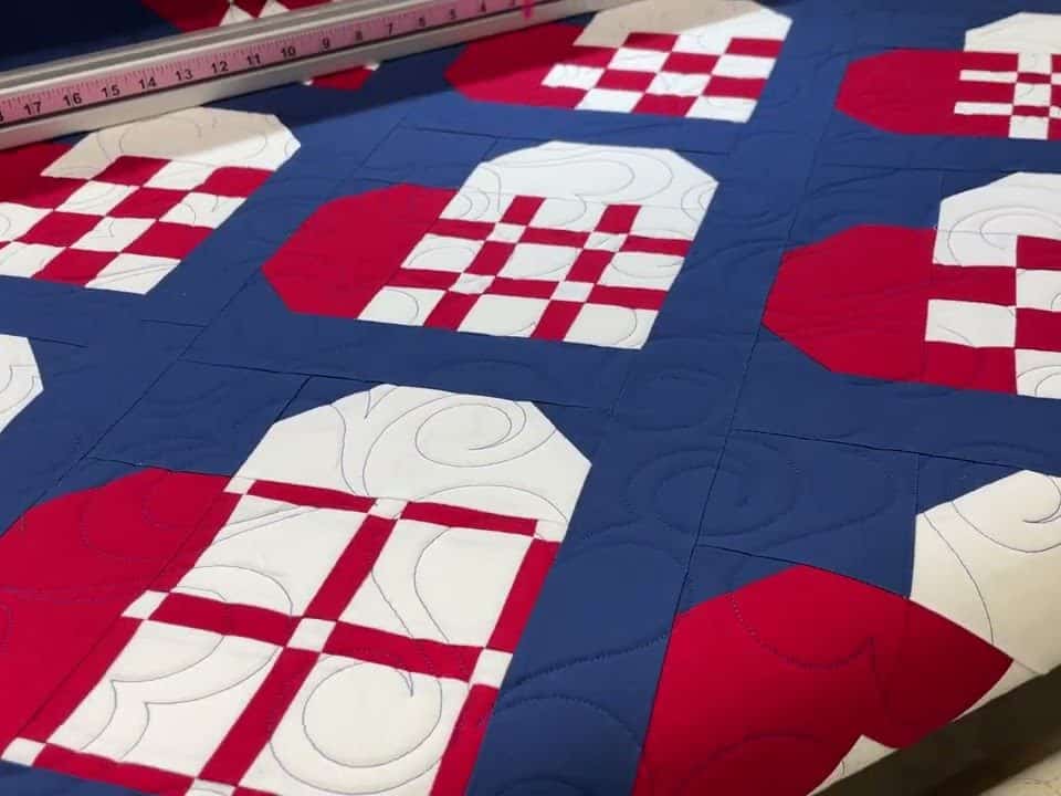 Doreen’s “Scandi Hearts” quilt - Longarm quilted by Maynard Longarm Quilting